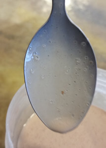 Spoon dipped in Keto Chow. It's mostly bubbles and psyllum that you see.