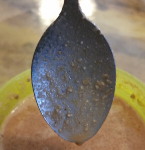 A spoon dipped in Ketofood, no chia seeds here